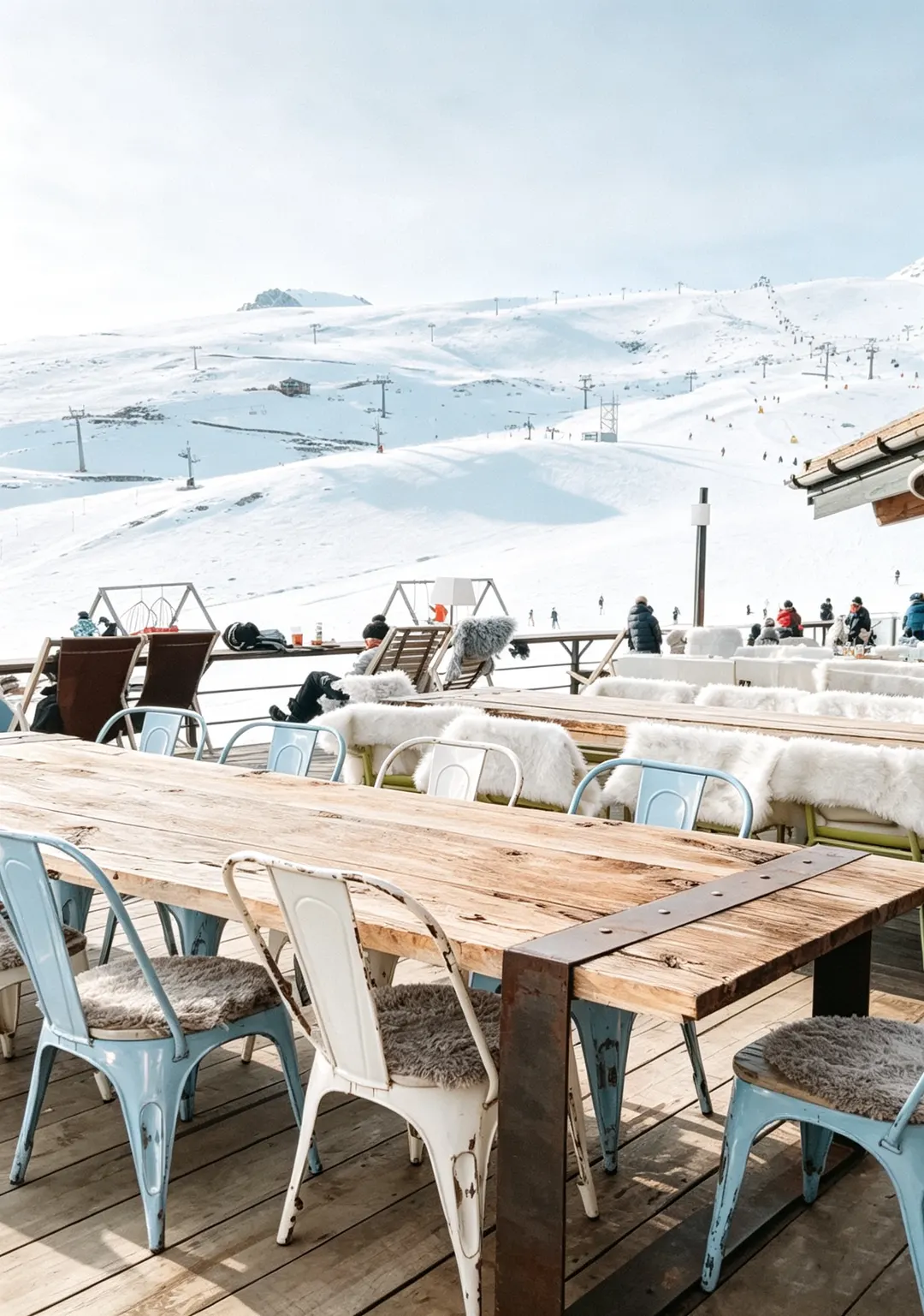 Table set with snowy peaks behind